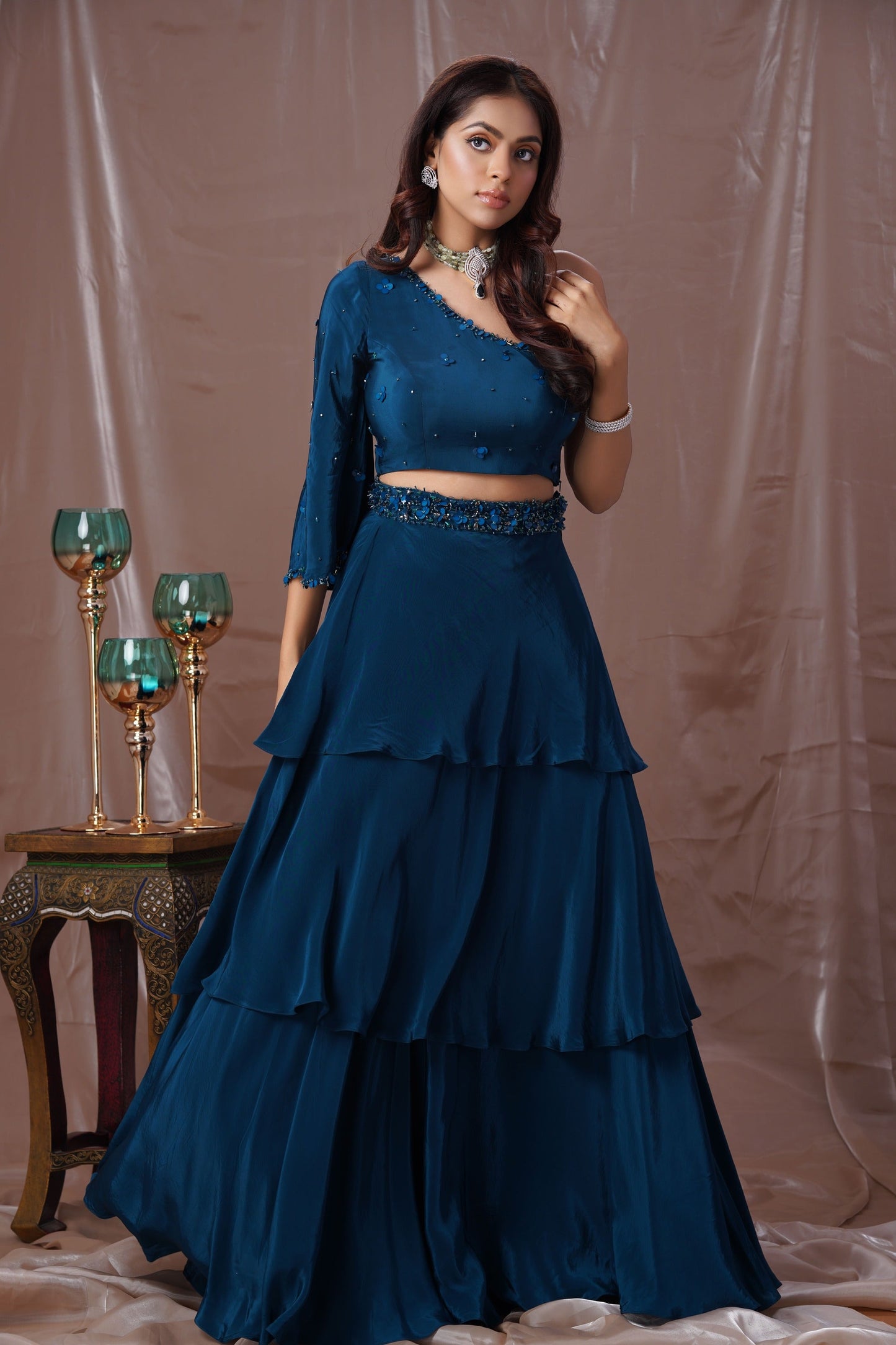 Teal Blue Layered Lehenga With A One Shoulder Blouse